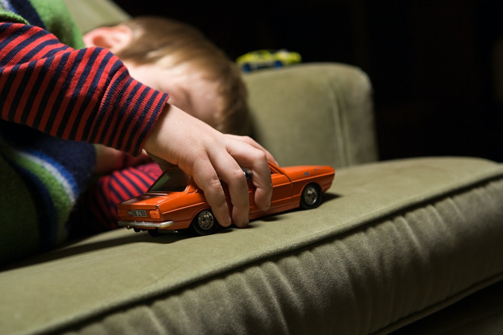 boy-playing-with-a-toy-car.jpg